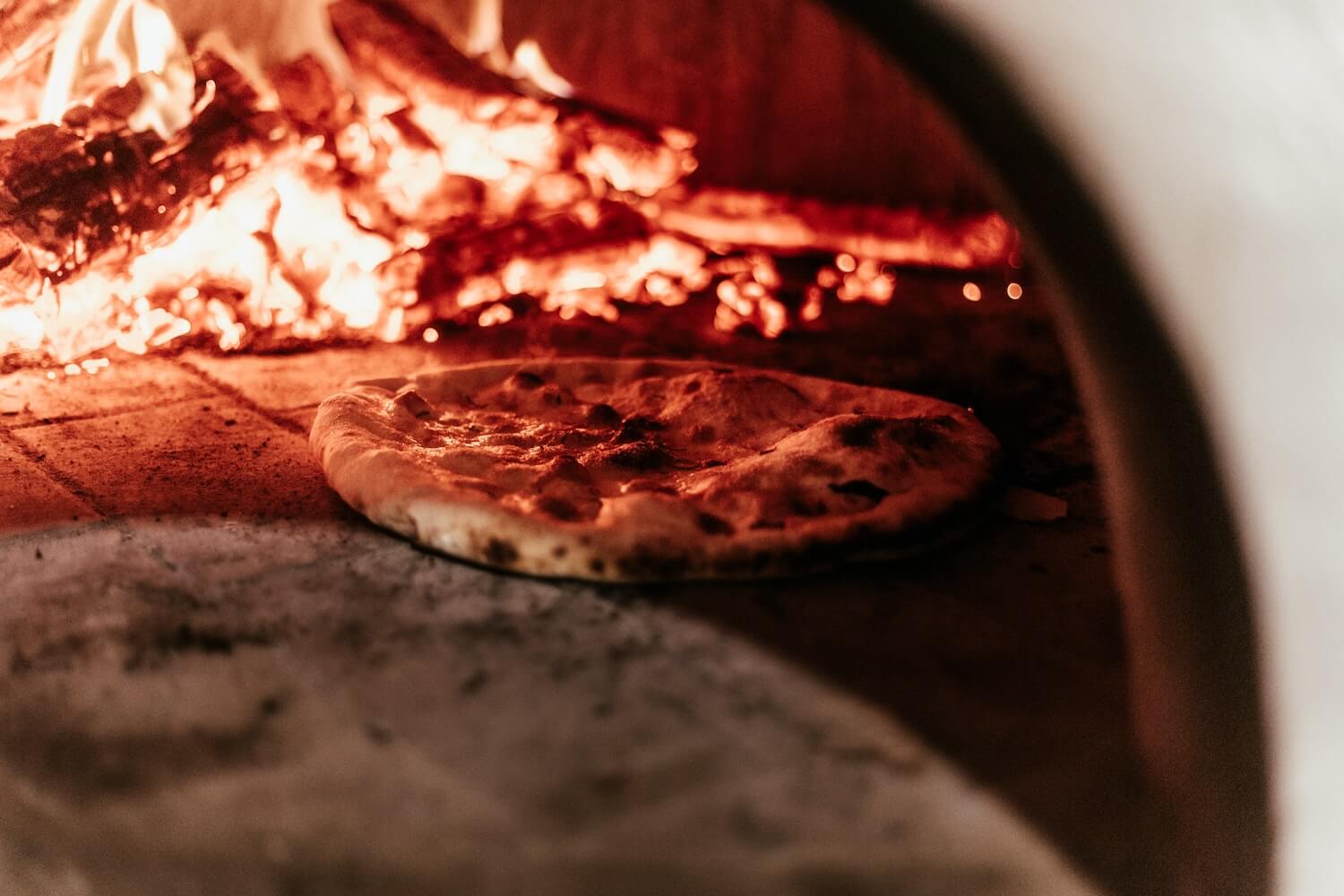 A neapolitan pizza cooking in the oven